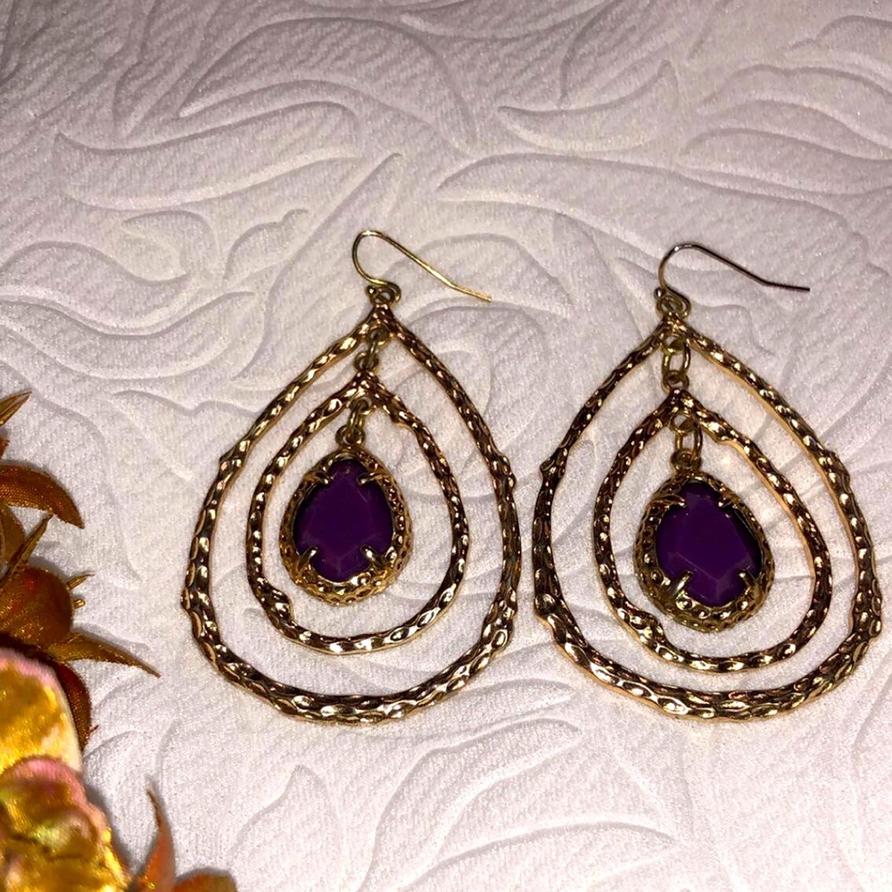 Gold and purple colored teardrop earrings. EUC